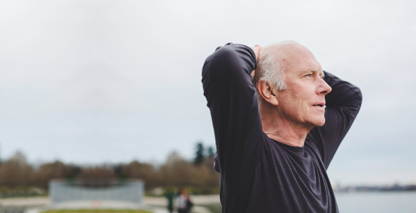 Elderly man stretching